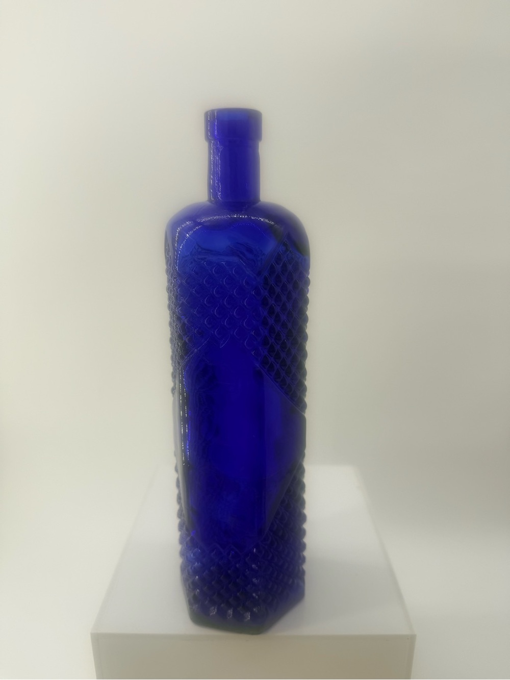 Deep Blue Decorative Glass Bottle - Sculpted Home Accent
